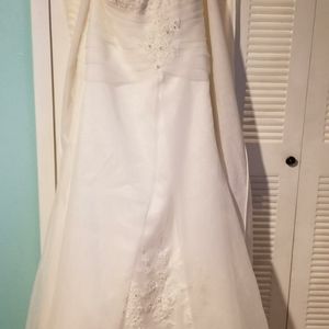 Brand new wedding dress in the bag